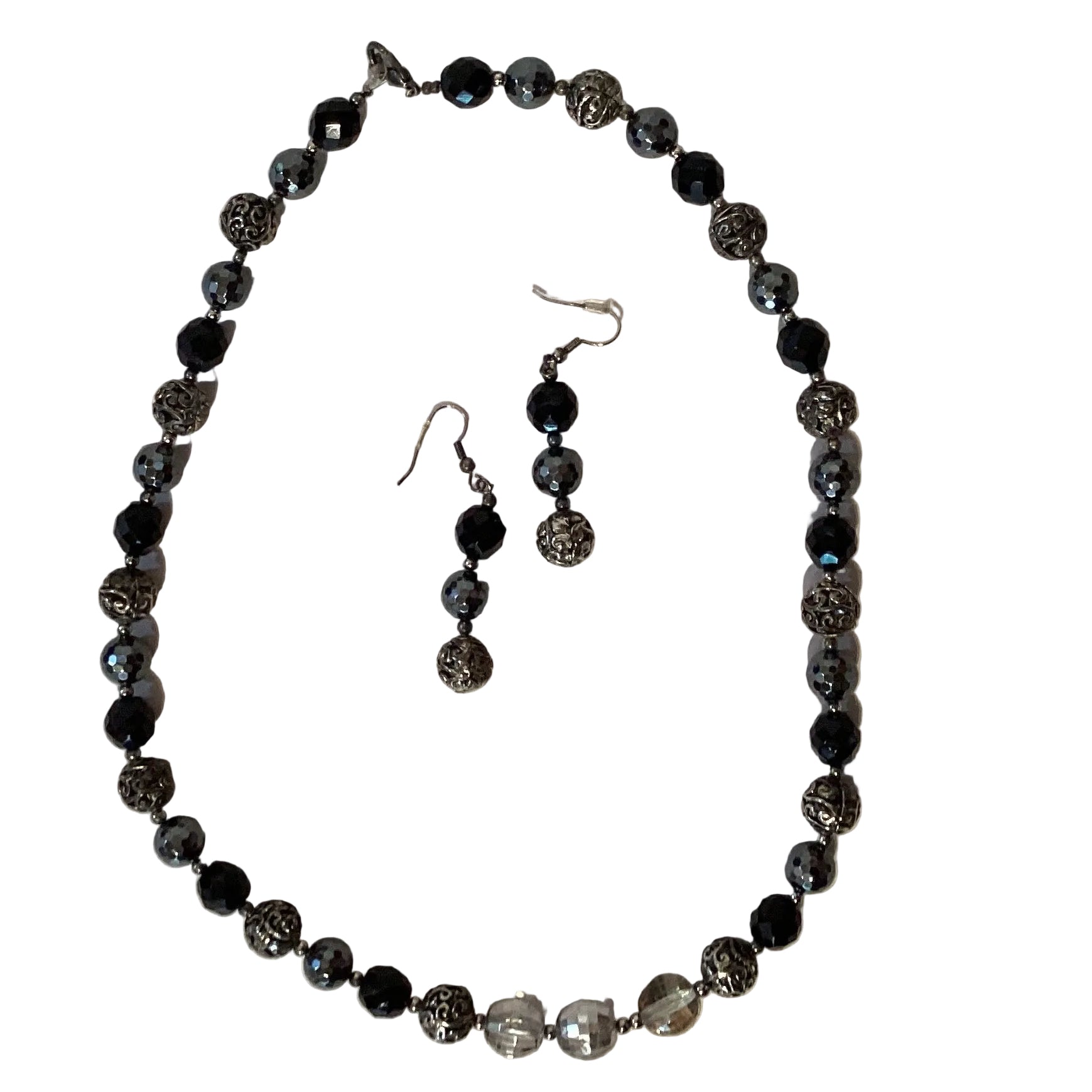 Beaded silver earrings and 21-inch necklace set from Ysleta Mission Gift Shop, featuring intricate beaded jewelry and accessories.