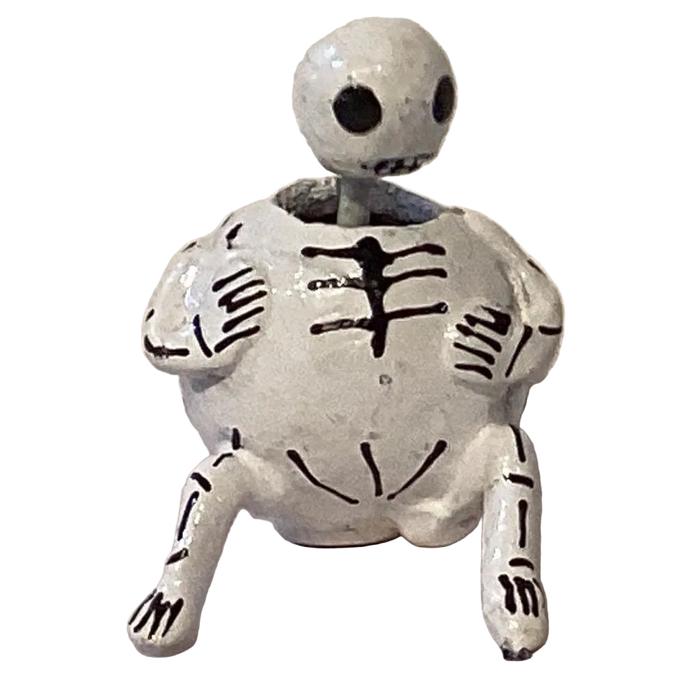 Skeleton Wobble Head figurine from Ysleta Mission Gift Shop, a whimsical home and garden decorative figurine with a wobbling head.