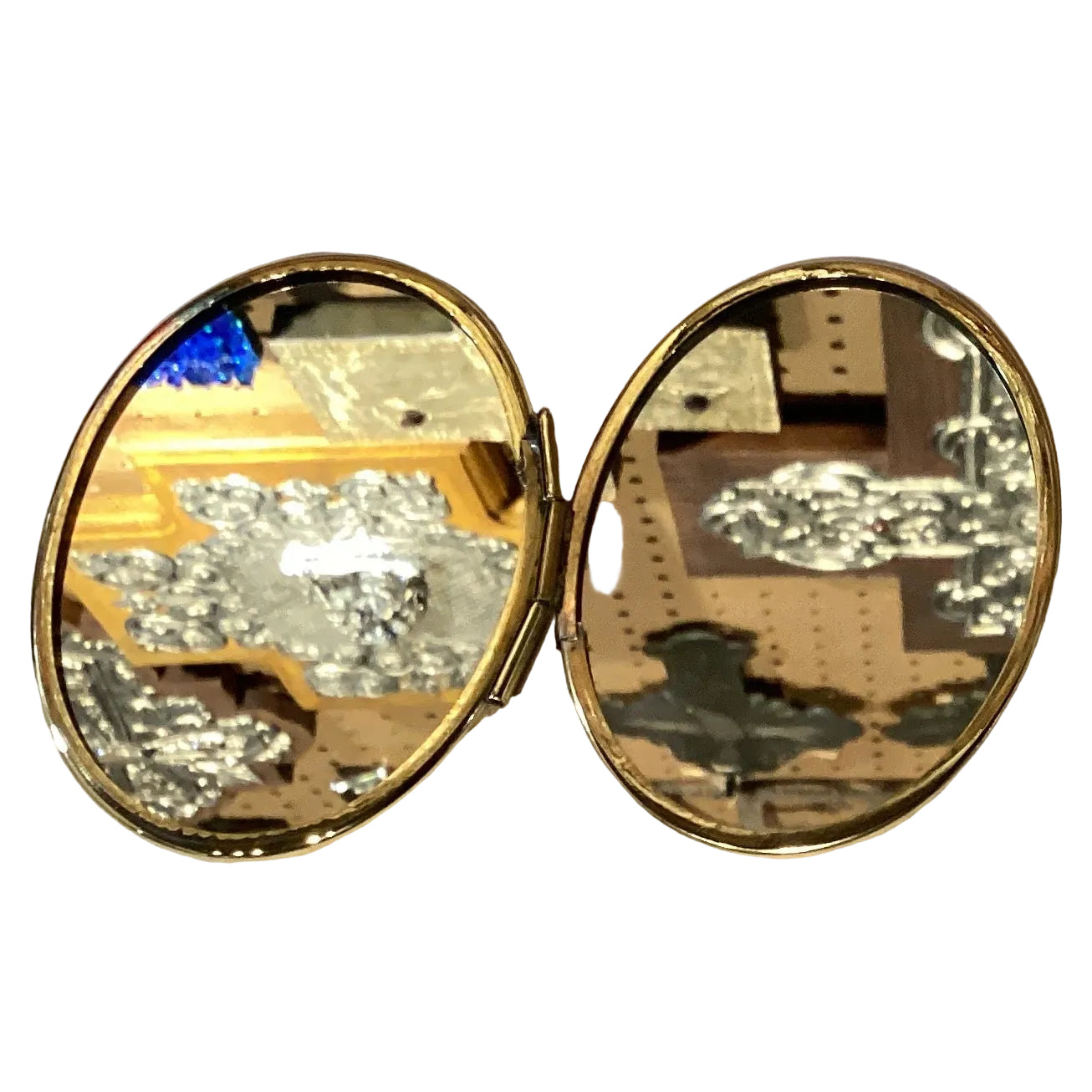 Virgin de Guadalupe 3-inch gold compact mirror with detailed religious image, ideal for accessories and personal use.