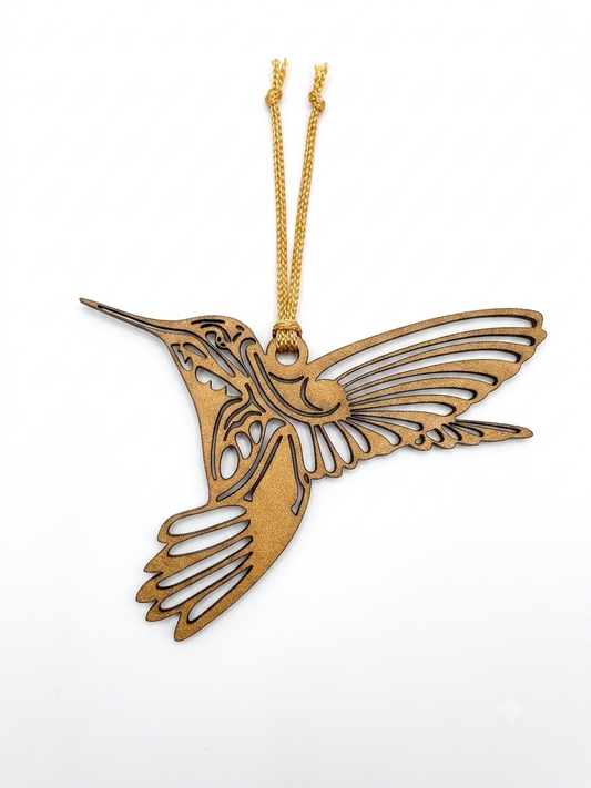 Laser-cut hummingbird wood ornament for Christmas holiday decorations, featuring intricate design by Norma Cordova De Schaefer.