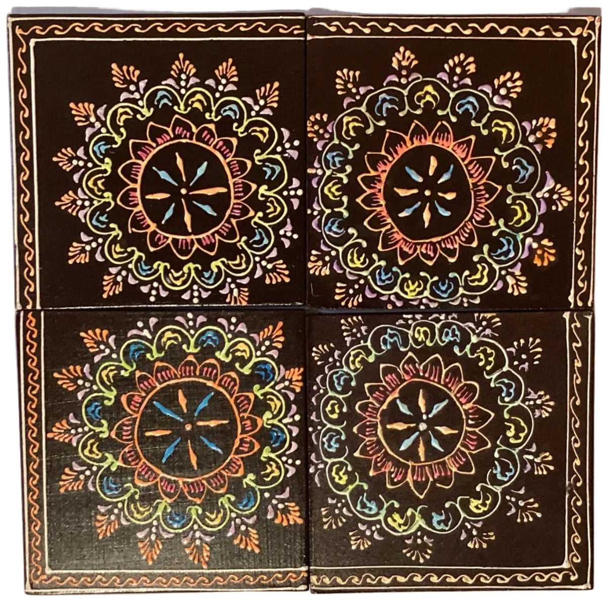 Colorful handcrafted wood mandala coaster set with folk art design, featuring five vibrant coasters for home and garden use.
