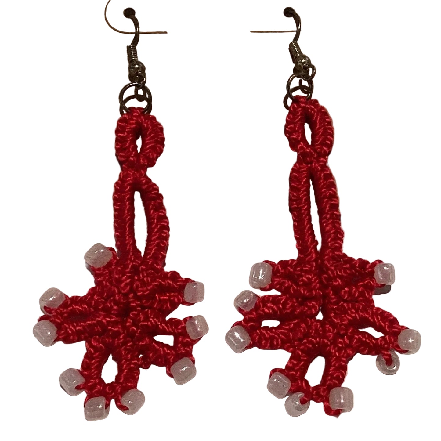 Colorful handcrafted beaded 2-inch crochet dangling earrings, cultural artisan jewelry with vibrant bead patterns.