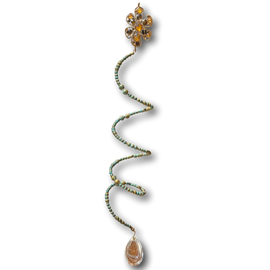Handmade 16-inch spiral suncatcher with turquoise copper patina flower, pearlized beads, and crystal teardrop rainbow prism.