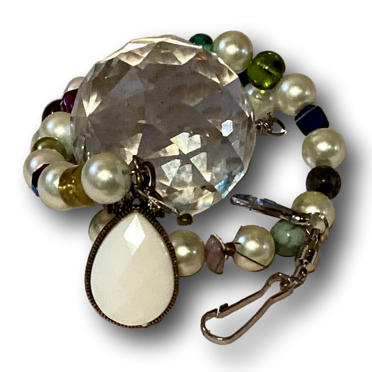 Handmade 16-inch crystal suncatcher with swirl design, pearlized beads, teardrop accents, and faceted crystal prism sphere.