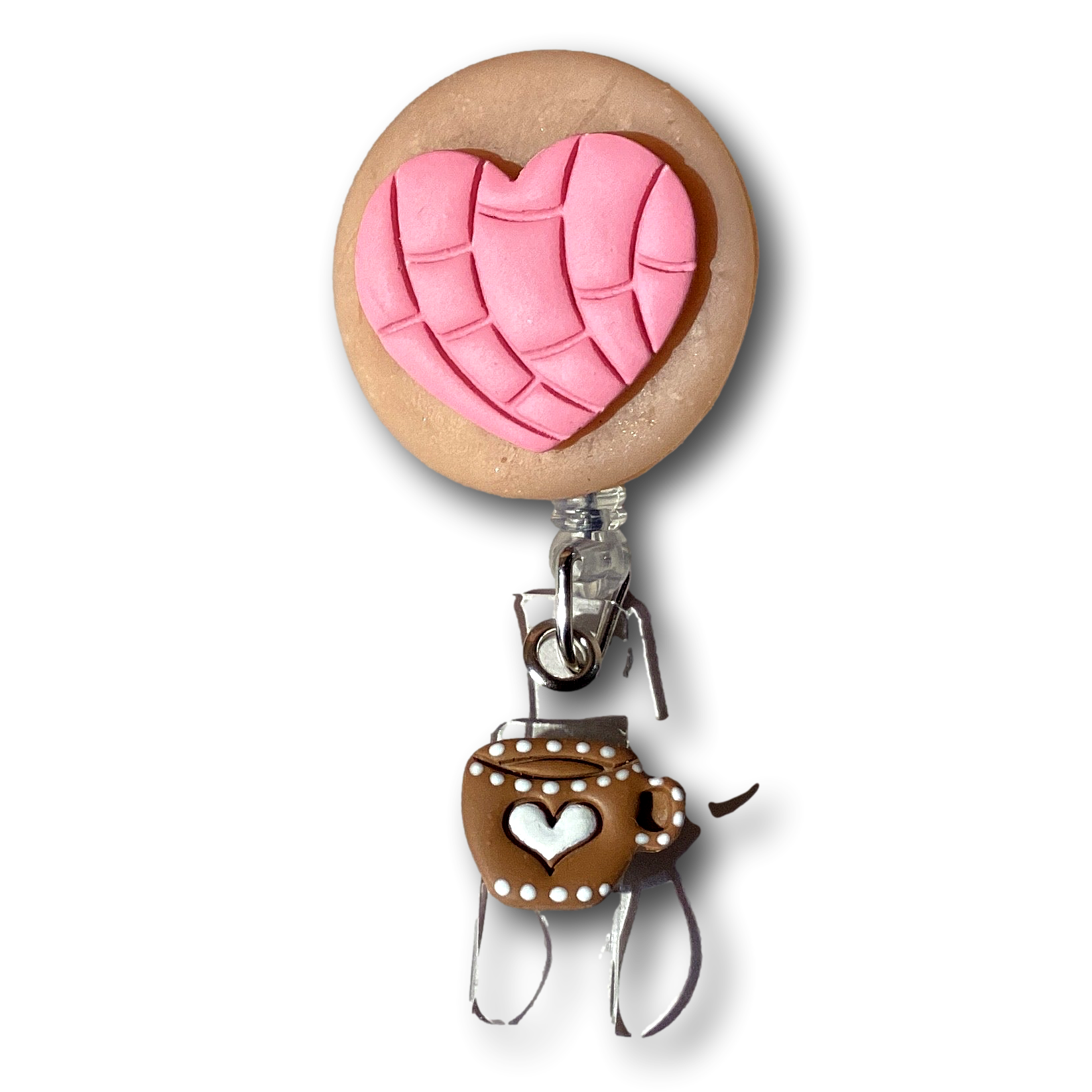 Melissa Cortinas Heart Concha badge holder with coffee cup dangle, retractable reel for ID badges, stylish and functional wearable accessory.