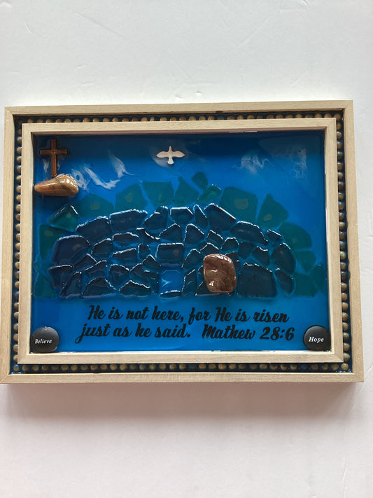 Resin wood plaque with "He Is Risen" inscription, 14x11 inches, Catholic Christian devotional gift by Brigitte Rosson.