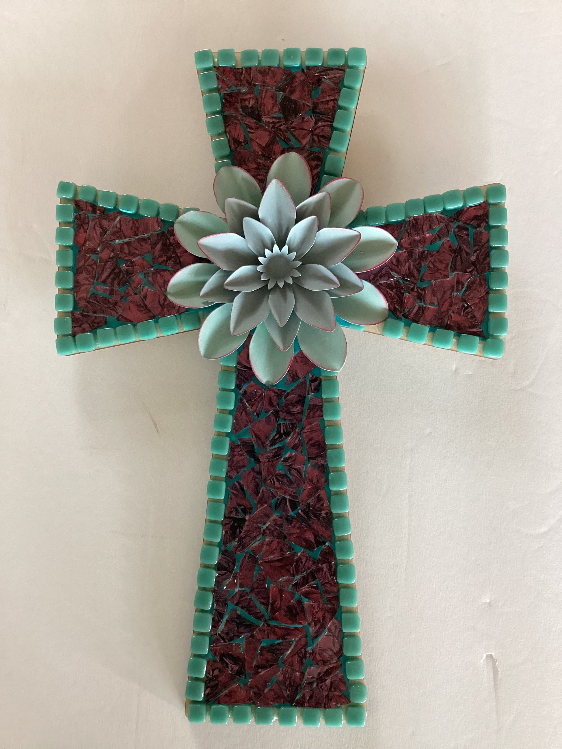 Glass cross on wood with teal flower, 12x11 inches, Catholic Christian gift from Brigitte Rosson, detailed and decorative religious decor.