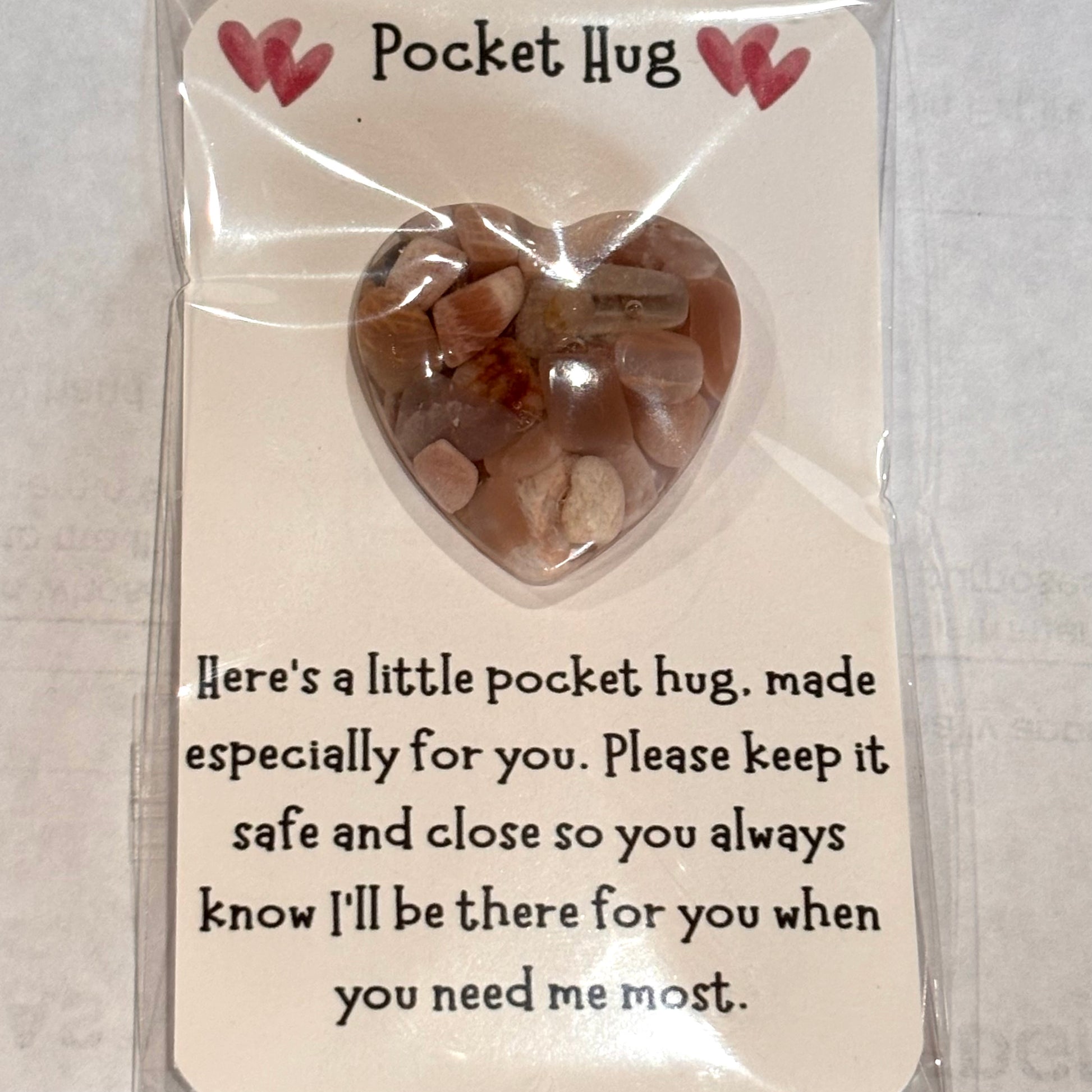 Handmade resin moonstone pocket hug card from Melissa Cortinas, 3x2 inches, features a delicate moonstone charm for emotional support.