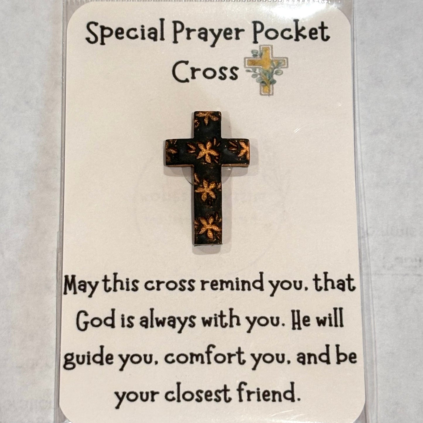 Handmade polymer clay floral cross pocket hug card in forest green, maroon, and plum purple by Melissa Cortinas.