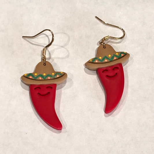 Handmade polymer clay Mexican chili dangle earrings by Melissa Cortinas, 1.5 inches long, colorful and stylish jewelry accessory.