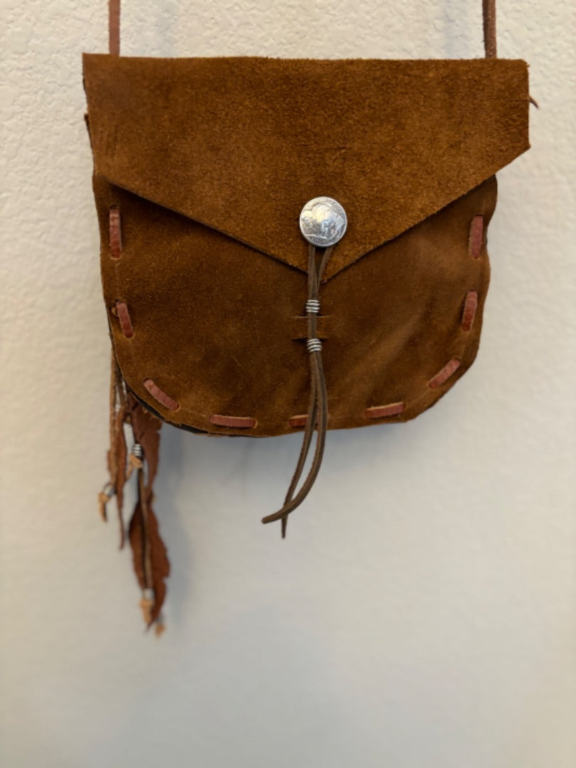 Handmade Leather Crossbody Bag with Buffalo Concho and Feather Tassels – 30-Inch Cord