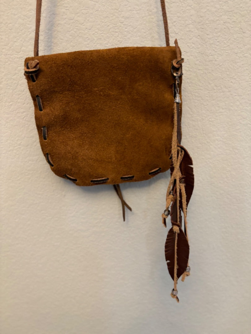 Handmade Leather Crossbody Bag with Buffalo Concho and Feather Tassels – 30-Inch Cord