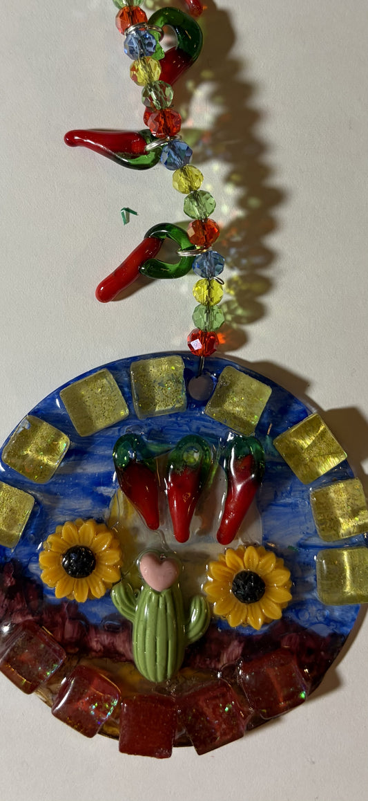 Colorful desert moon mountain mosaic suncatcher by Sylvia Leroux, featuring intricate glass design, 3-inch decorative garden ornament.