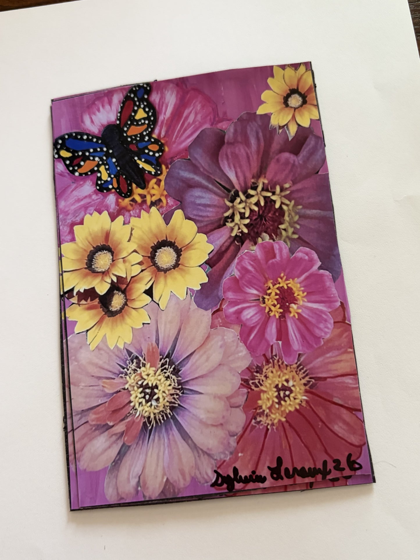 Vintage collage art magnet by Sylvia Leroux featuring butterflies, flowers, and artistic prints for home and refrigerator decor.
