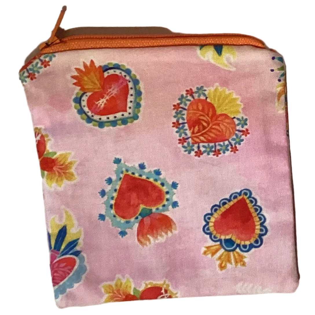 Sacred Heart 3-inch zipper pouch from Ysleta Mission Gift Shop with vibrant religious design and durable fabric.