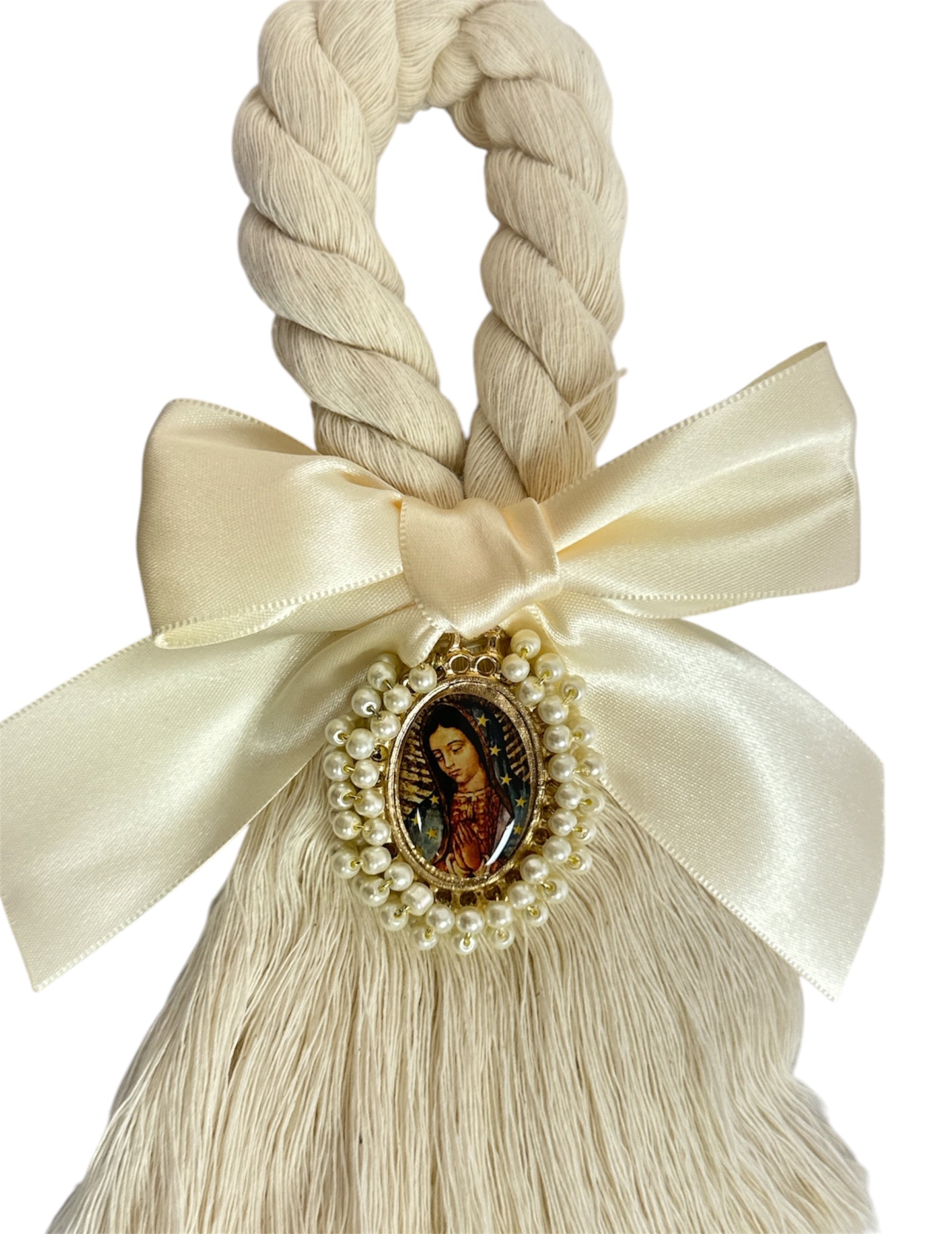 Cream satin bow featuring Our Lady of Guadalupe for door blessing, by Jose Alberto Chavez, Catholic devotional ornament.