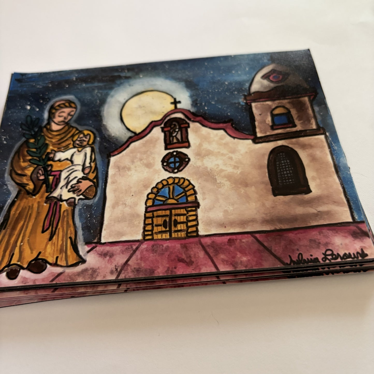 Saint Anthony magnet featuring Ysleta Mission artwork, from Sylvia Leroux's El Paso souvenir collection, perfect for magnets or gifts.