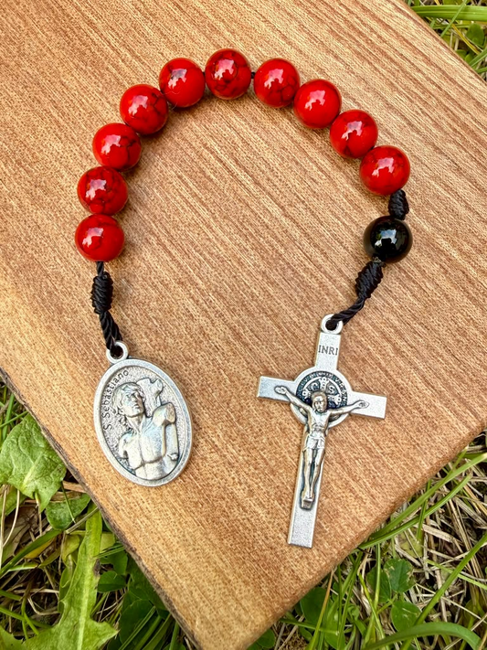 Saint Sebastian Jasper Catholic pocket rosary with one decade, featuring beads and a crucifix, by Liza Murphy for Christian prayer.