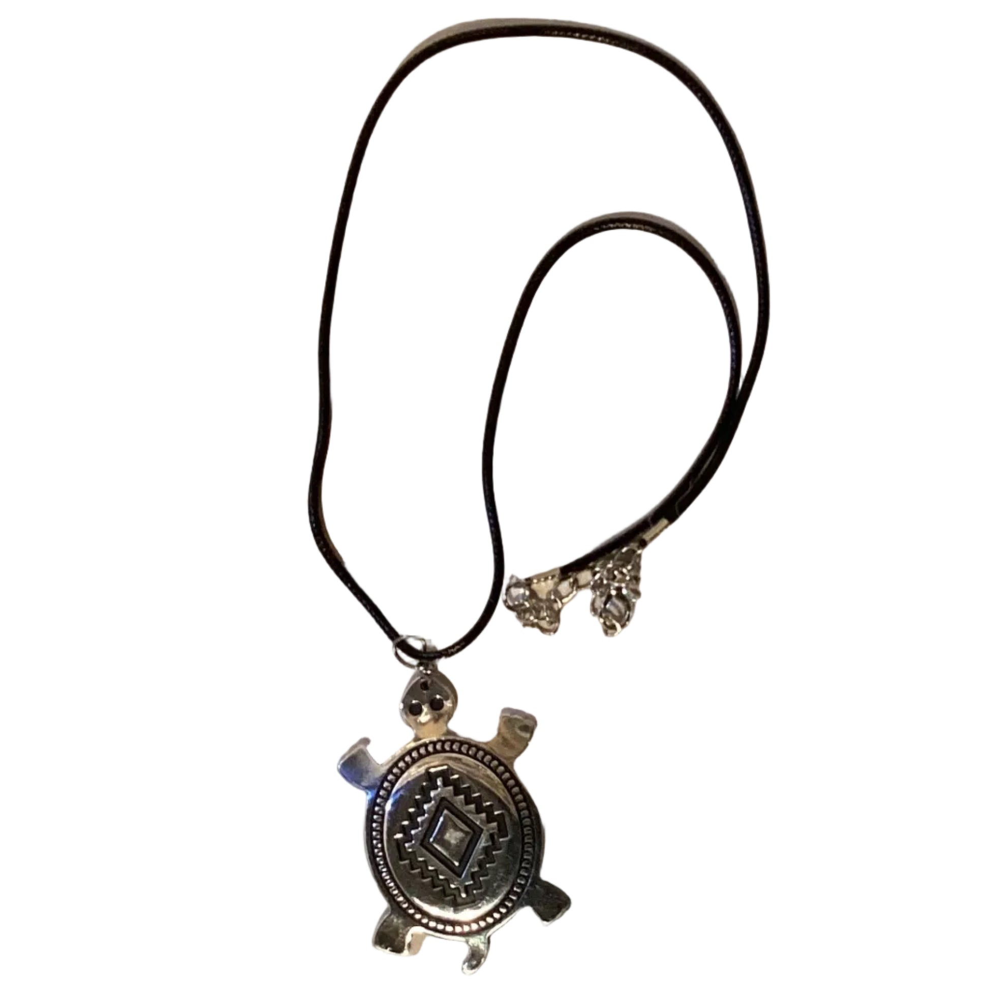 Silver-tone turtle pendant necklace with Southwestern geometric design on black cord, 18-inch jewelry by Ysleta Mission Gift Shop.