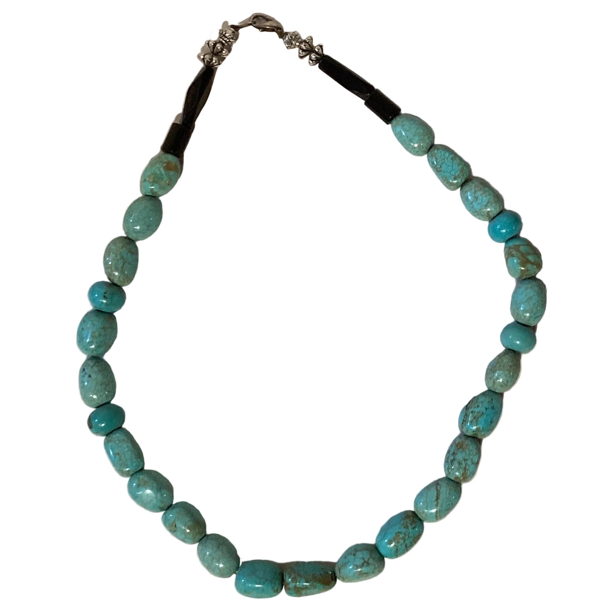 Turquoise stone nugget necklace with black cord and silver accents, 18-inch Native American-inspired jewelry.