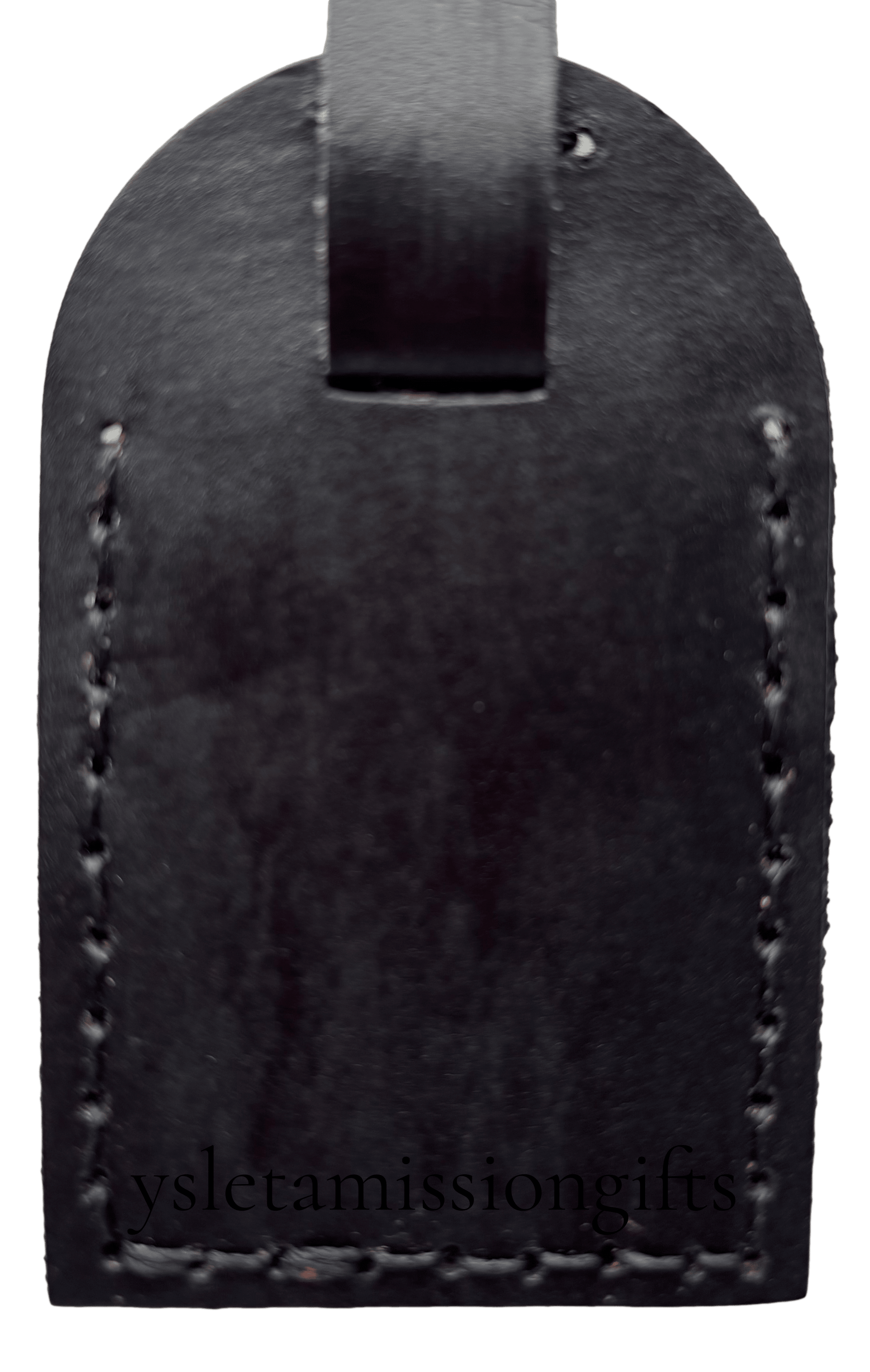 Black leather luggage tag by Consuelo Barraza, stylish accessory for travel and luggage identification.