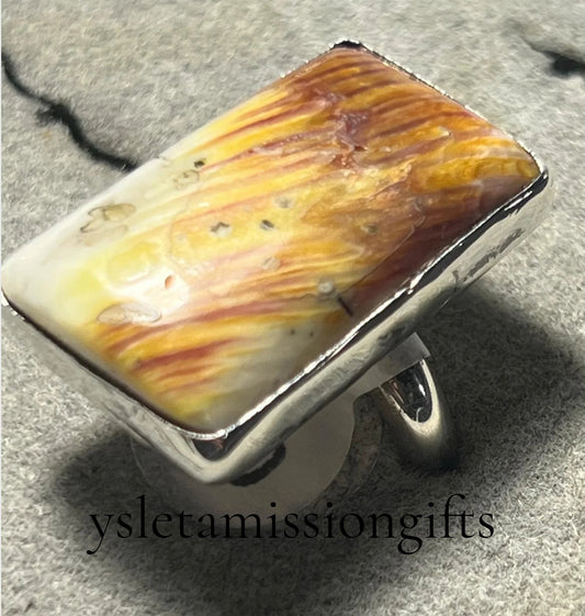 Sterling silver Native American ring with a bright spiny oyster shell, size 7.5, by Ray Duck Garcia.
