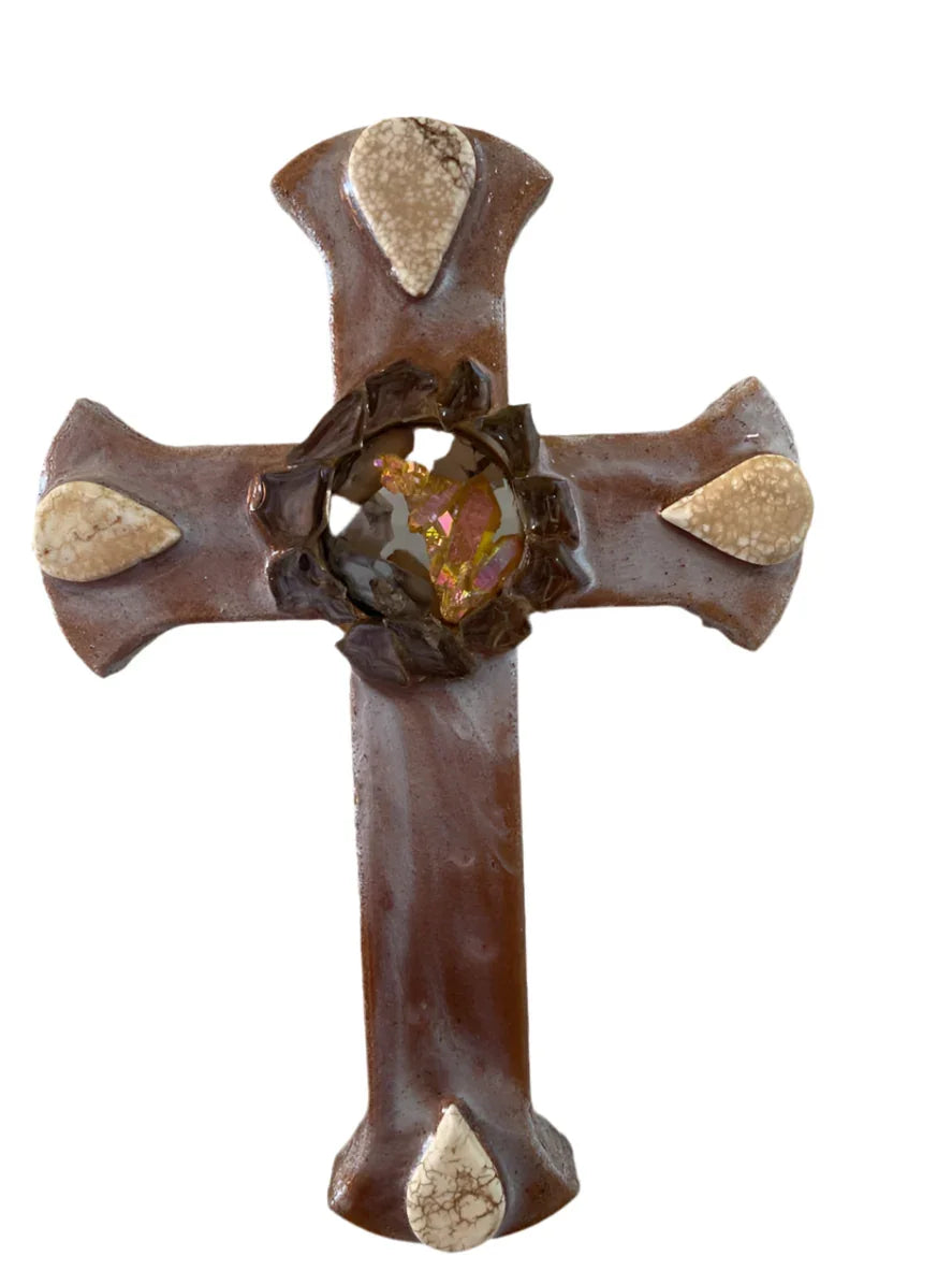 Brown cream resin Catholic cross with glass and crystal accents and a four-stone centerpiece, designed by Brigitte Rosson.