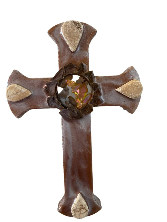 Brown cream resin Catholic cross with glass and crystal accents and a four-stone centerpiece, designed by Brigitte Rosson.