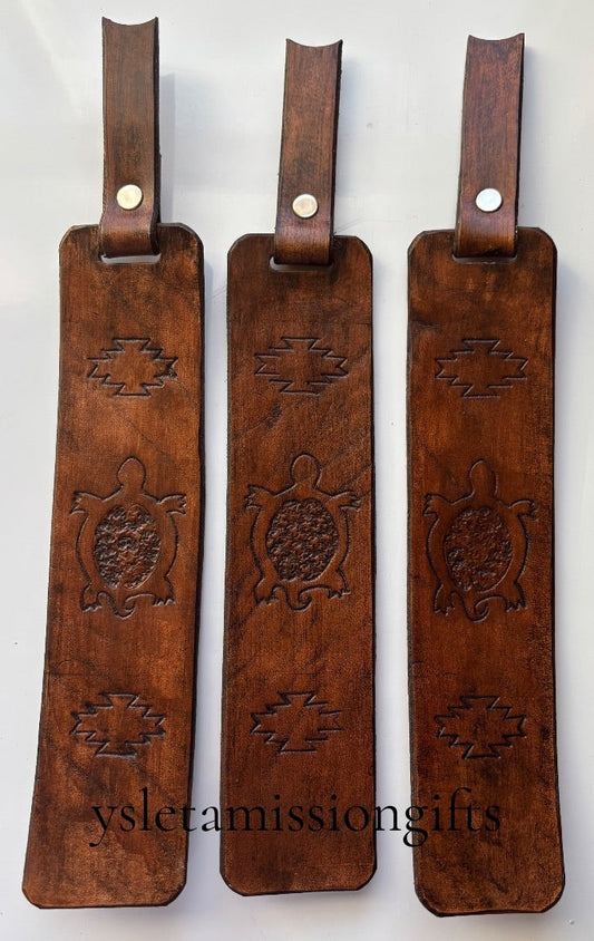Brown Southwest leather bookmark by Consuelo Barraza featuring intricate leatherwork, perfect for marking pages in style.
