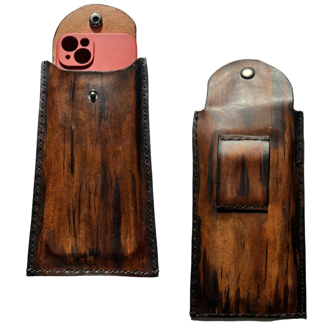 Handmade brown veg tan leather iPhone 15 case with rustic design, crafted as a stylish phone sleeve by Consuelo Barraza.