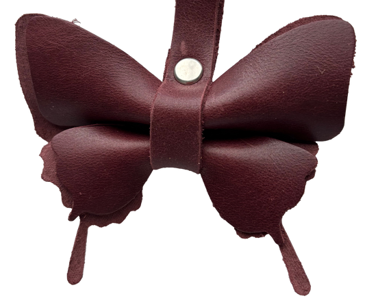 Silver butterfly keychain by Consuelo Barraza featuring a snap clip, ideal for handbags and wallets.