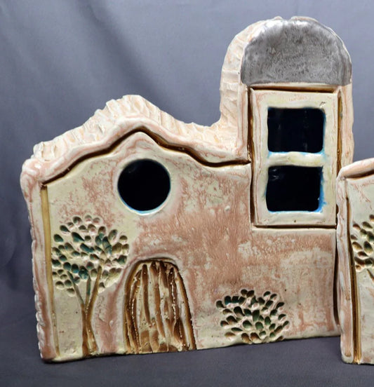 Large ceramic Ysleta Mission Luminario by Vanessa Clark, detailed El Paso souvenir with traditional mission design and colorful accents.