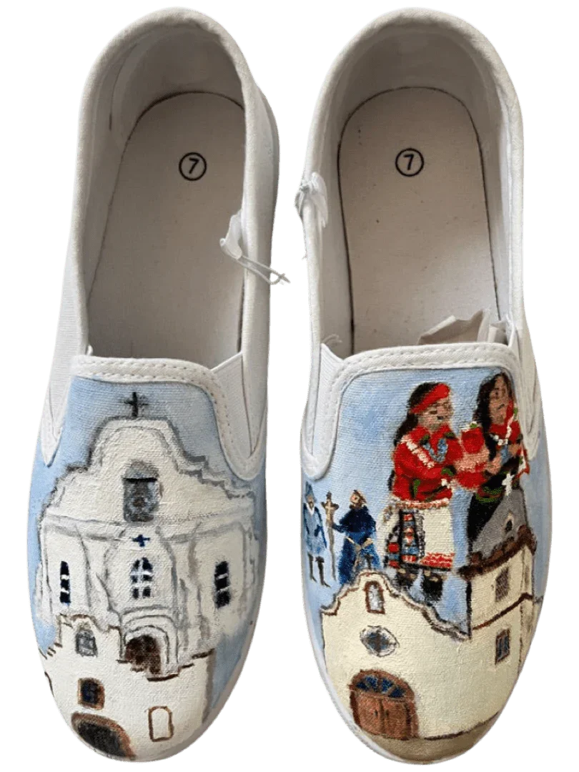 Handpainted women’s canvas shoes featuring Ysleta Mission Trail and Tigua Tribe designs by Cheryl Peterson.