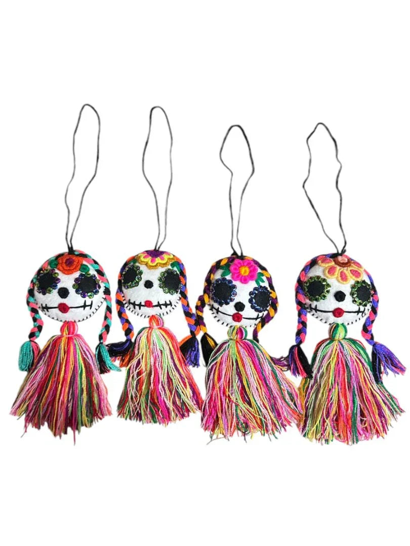 Colorful Day of the Dead embroidered tassel charm by Jose Alberto Chavez, featuring vibrant Mexican artisan design for bags, keys, or decor.