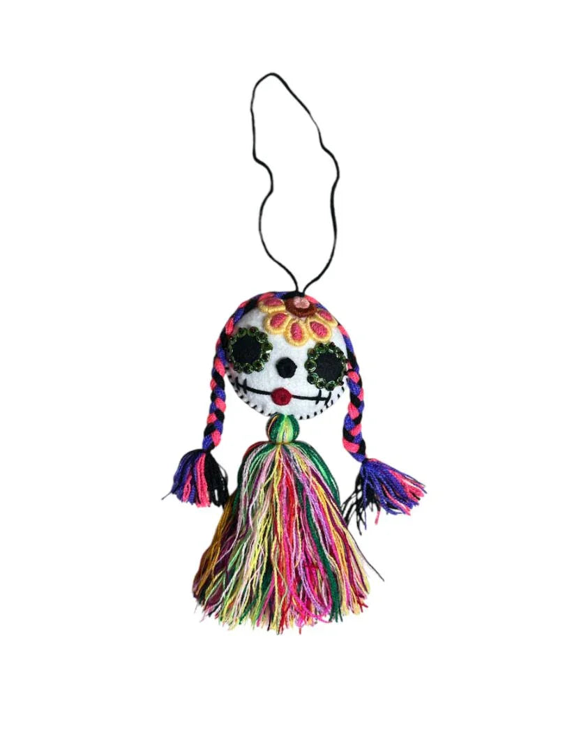 Colorful Day of the Dead embroidered tassel charm by Jose Alberto Chavez, designed for bags, keys, and home decor.