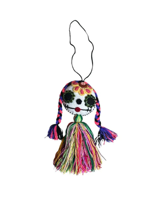 Colorful Day of the Dead embroidered tassel charm by Jose Alberto Chavez, designed for bags, keys, and home decor.