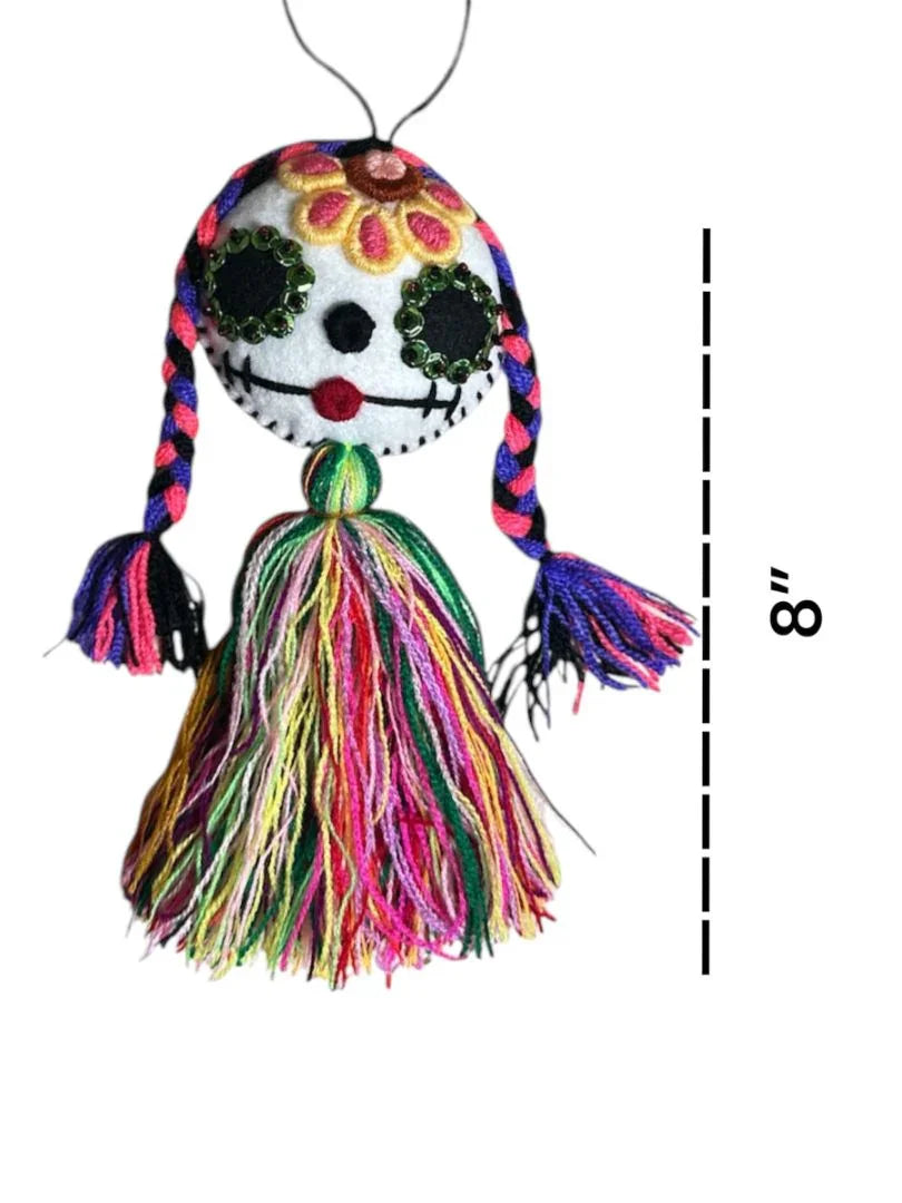 Colorful Day of the Dead embroidered tassel charm by Jose Alberto Chavez, ideal for bags, keys, and home decor.