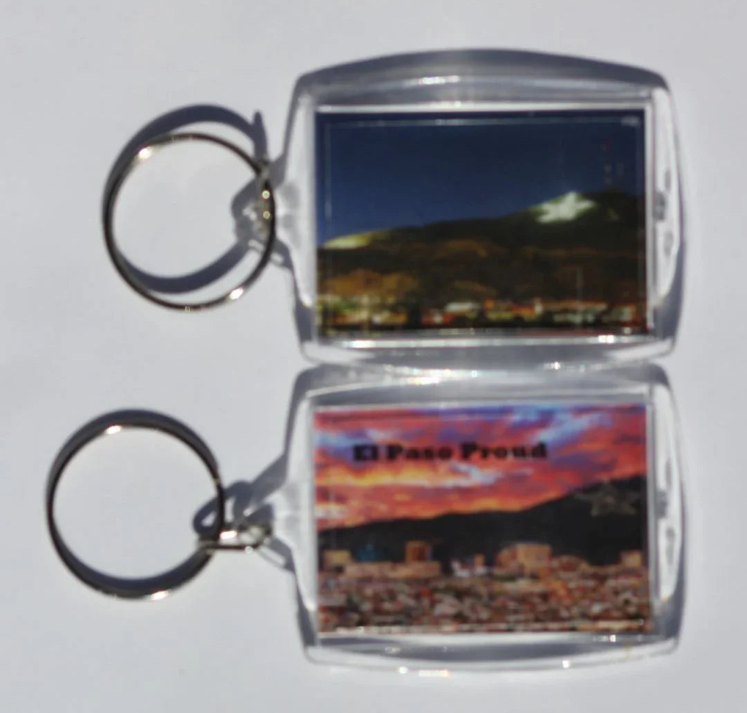 Double-sided El Paso Proud Sunset Night Sky acrylic keychain by Miguel Martinez, featuring vibrant sunset and night sky imagery.
