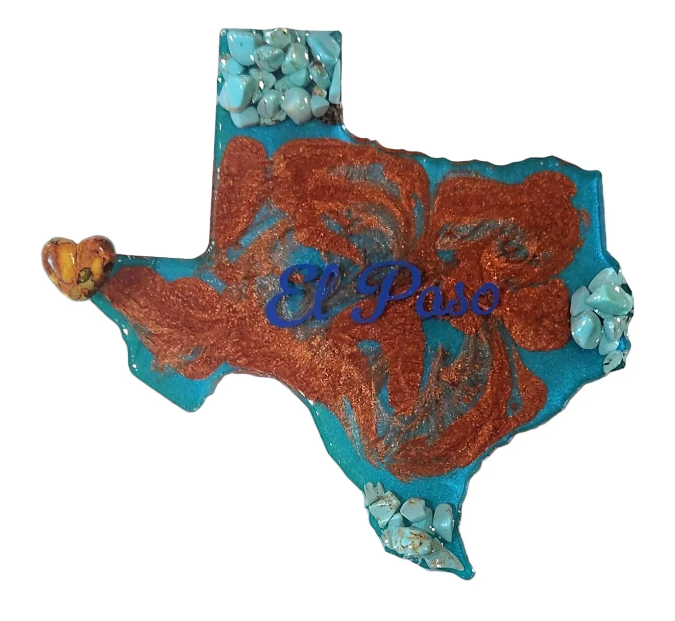 Assorted El Paso resin magnets featuring southwestern designs and keepsake motifs, crafted by Brigitte Rosson.