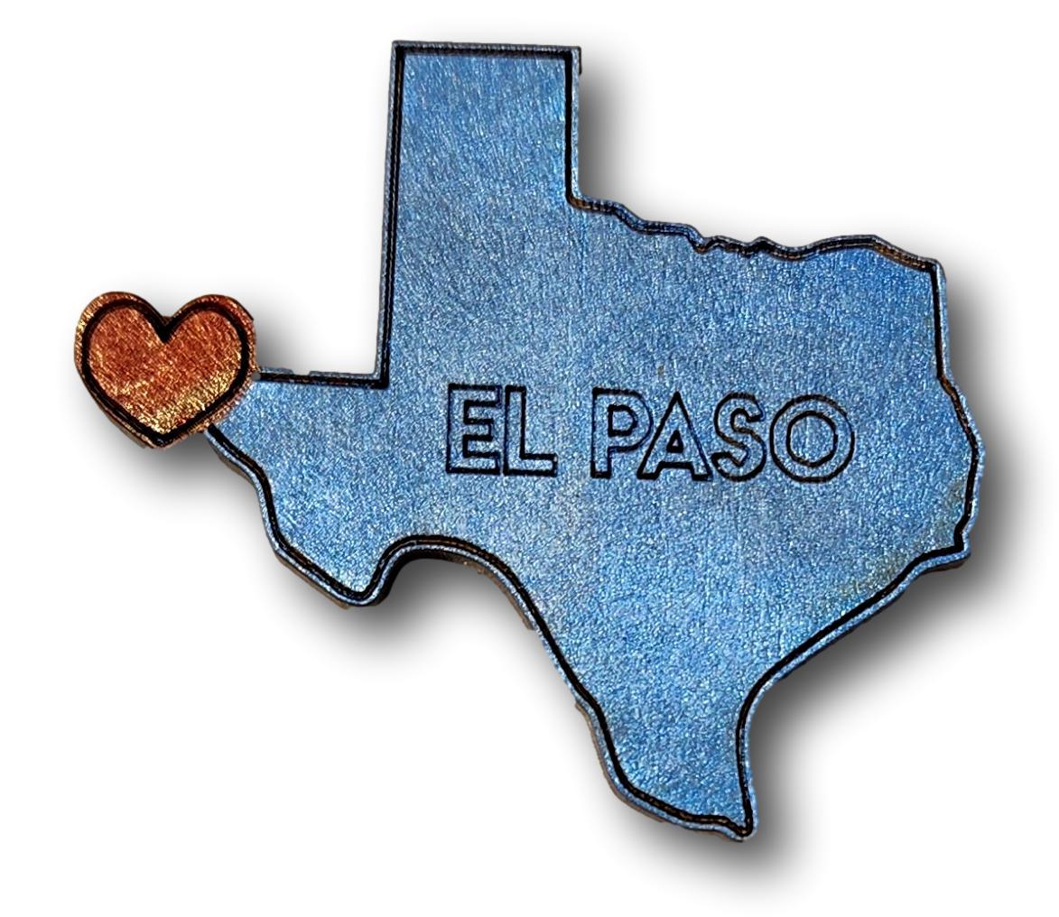 Laser cut wood magnet in El Paso Texas shape, 2x1.8 inches, souvenir gift by Norma Cordova De Schaefer, ideal for souvenirs or decor.