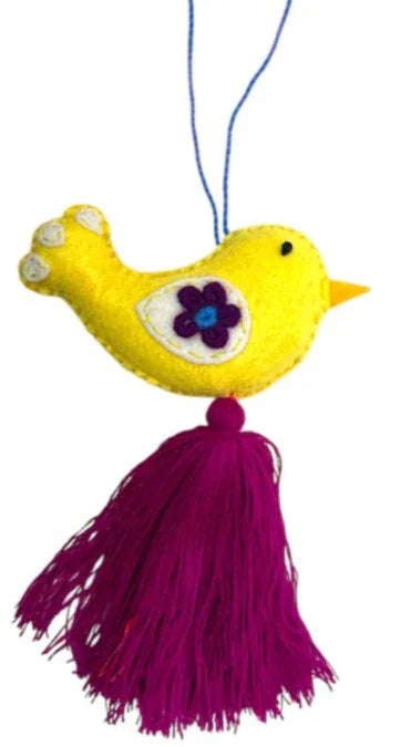 Colorful embroidered bird charm by Jose Alberto Chavez, handmade bag or car accessory with vibrant detailed stitching.