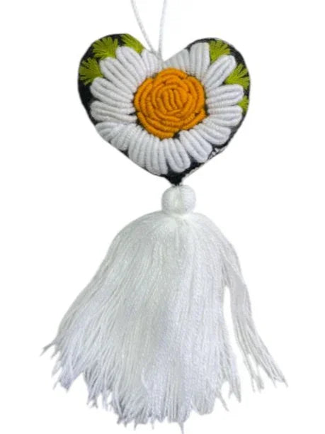 Handmade embroidered heart charm with colorful Mexican textile design, by Jose Alberto Chavez, ideal as a bag accessory or decorative ornament.