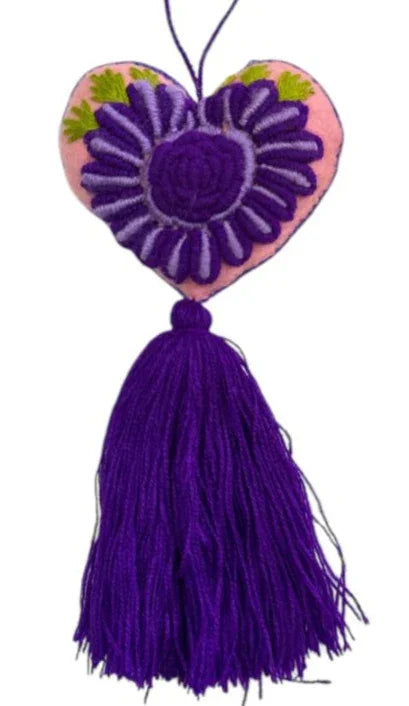 Handmade embroidered heart charm by Jose Alberto Chavez, Mexican textile ornament designed as a bag accessory.