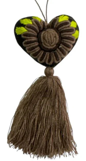 Embroidered heart charm made from handmade Mexican textile, designed by Jose Alberto Chavez for bag accessories.