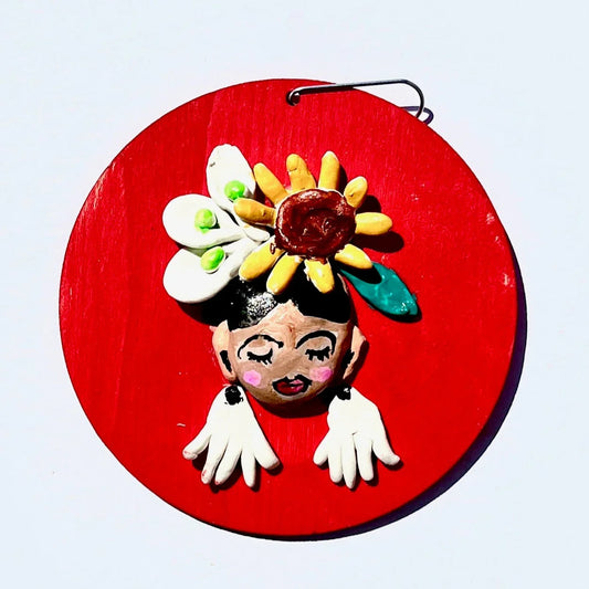 Handmade Frida ornament featuring 3D polymer clay art on wood, decorative home and garden ornament by Susan W Perez