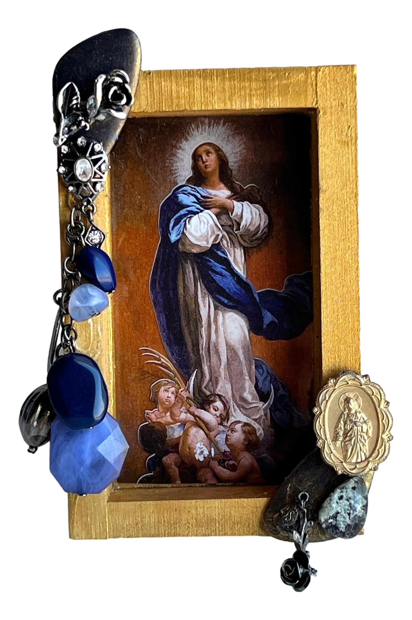 Handcrafted Catholic jewelry and religious recycled art from Ysleta Mission Gift Shop, featuring unique found item designs.