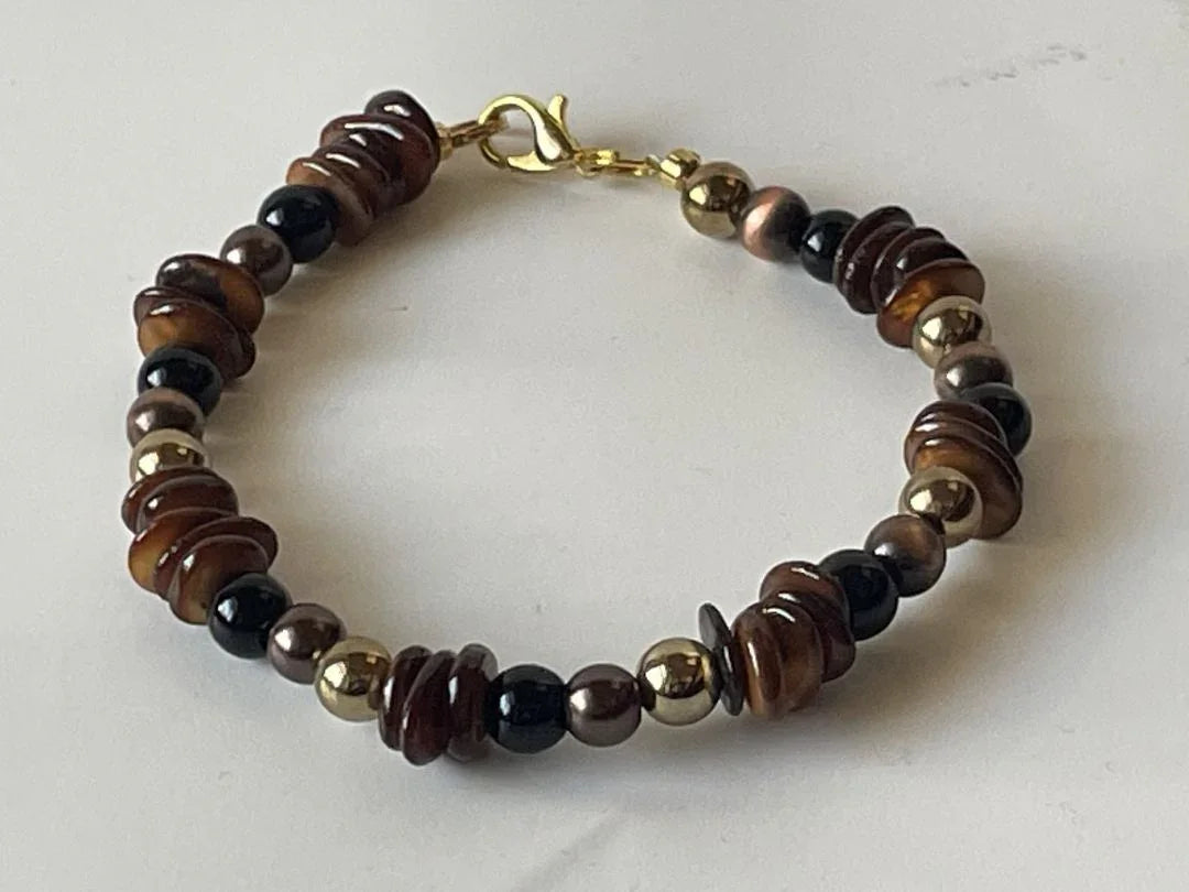 Gold and copper obsidian beaded bracelet, 7-inch jewelry accessory by Sylvia Leroux featuring polished round stones.