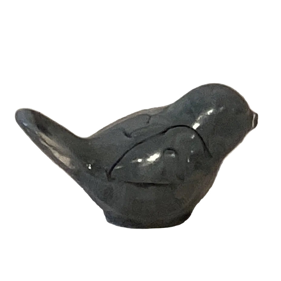 Gray resin perched bird figurine for art, crafts, and display, 2-inch mini bird from Ysleta Mission Gift Shop.