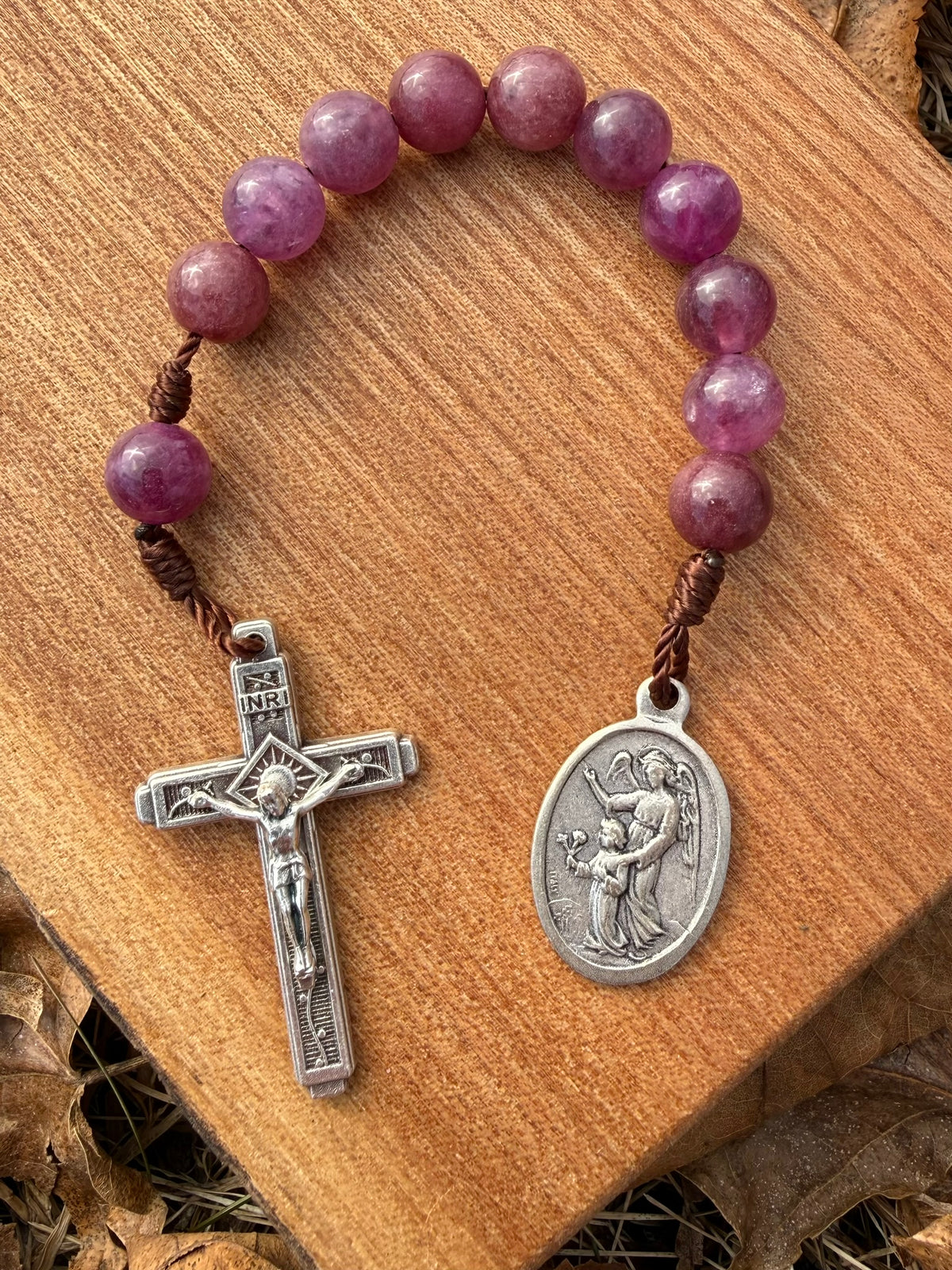 Purple quartz Catholic pocket rosary with guardian angel charm, one decade, by Liza Murphy, featuring Christian prayer beads.