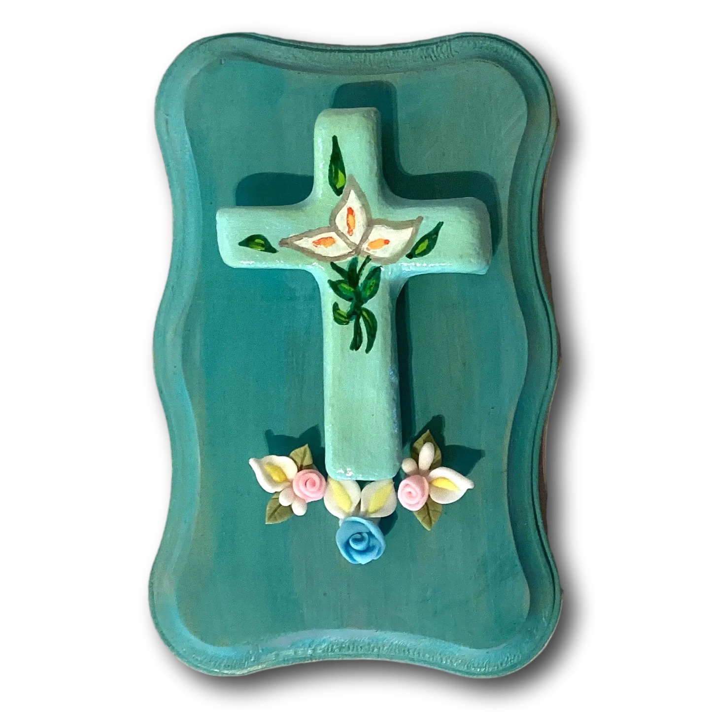 Hand-painted teal cross plaque with lily flowers, Catholic Christian wall decor, 5x3 inches, religious gift art.